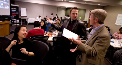 Derek Rucker (center) of Kellogg is among the 40 best business school profs under 40.
