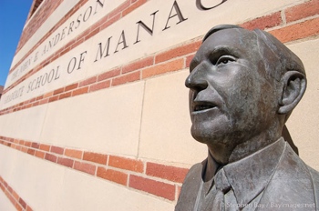 A bust of alumnus John Anderson outside UCLA's business school pays tribute to his near $49 million in donations.