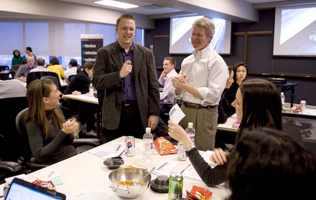 Kellogg marketing professors Derek Rucker (left) and Tim Calkins at last year's Super Bowl Advertising Review