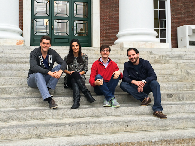Harvard MBA students (L-R) Fred Spring, Christina Sgardeli, Andrew Cedar, and Tewfik Cassis received their 5,000th website hit Sept. 25.
