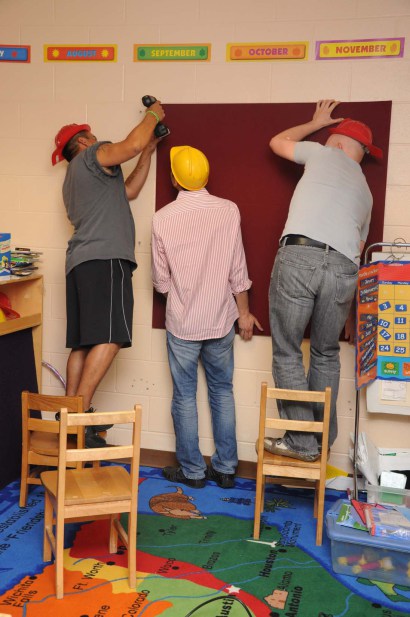 BCG employees volunteering at a local school