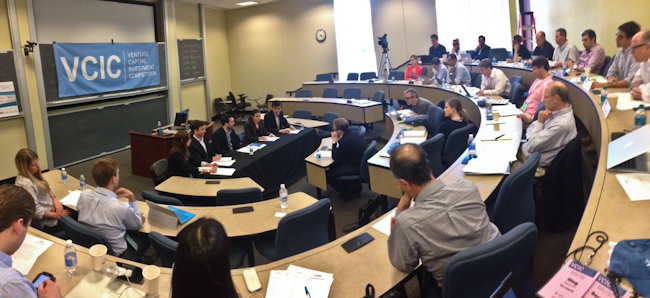 Student teams listening to a pitch at the 2015 VCIC competition at Kenan-Flagler