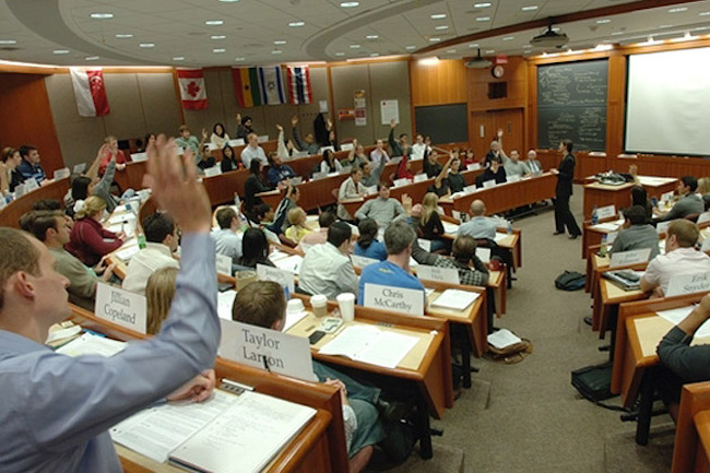 A case study discussion plays out in a Harvard Business School class