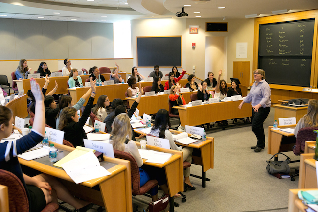 HBS Professor Francis Frei in a case study discussion class with young women from women's only colleges
