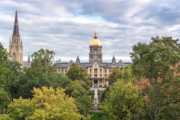 September 28, 2017; Fall foliage over the Main Quad with the Main Building and Basilica of the Sacred Heart bathed in early morning light. (Photo by Barbara Johnston/University of Notre Dame)