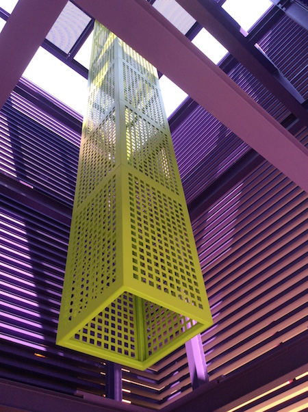 The Tower Entrance is the main entryway from the Arrival Walk into Highland Hall. The iconic four-story Tower Entrance makes an artistic statement. It serves as a beacon with its unique design and brightly colored vertical light in the center.