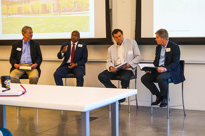 Members of the first panel at Stanford GSB's Future of Innovation event. Pictured from left to right are John Roberts, Daryn Dodson, George Foster, and Steve Ciesinski. Photo by Nathan Allen
