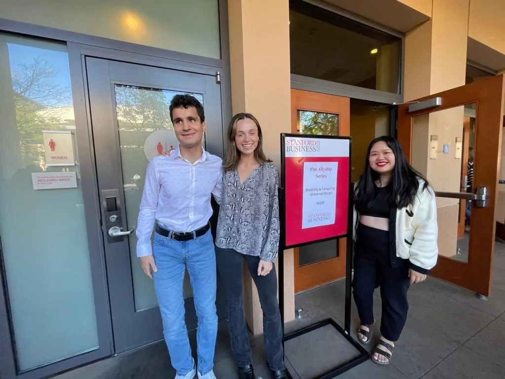 Co-founders of the Stanford GSB Disabilities and Caregivers Club outside their Allyship education event focused on Universal Design. They are, from left, Batu Demir, MBA '25, Paulina Paras, MBA '24, and Sophia Fang, MBA '24.